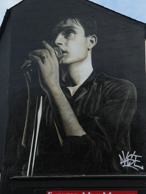 Ian Curtis's mural by Akse on Mill street