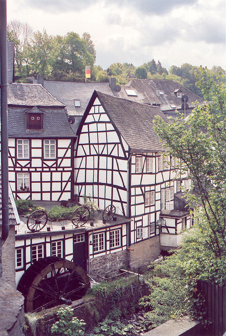 Half-timbered houses & water mill along the Rur river